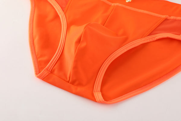 MCE X Shea Couleé orange swim briefs