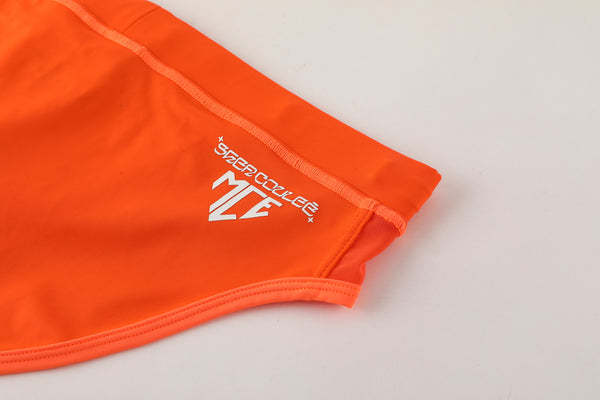 MCE X Shea Couleé orange swim briefs